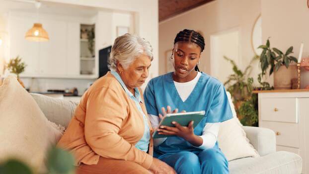 Caregiver with tablet